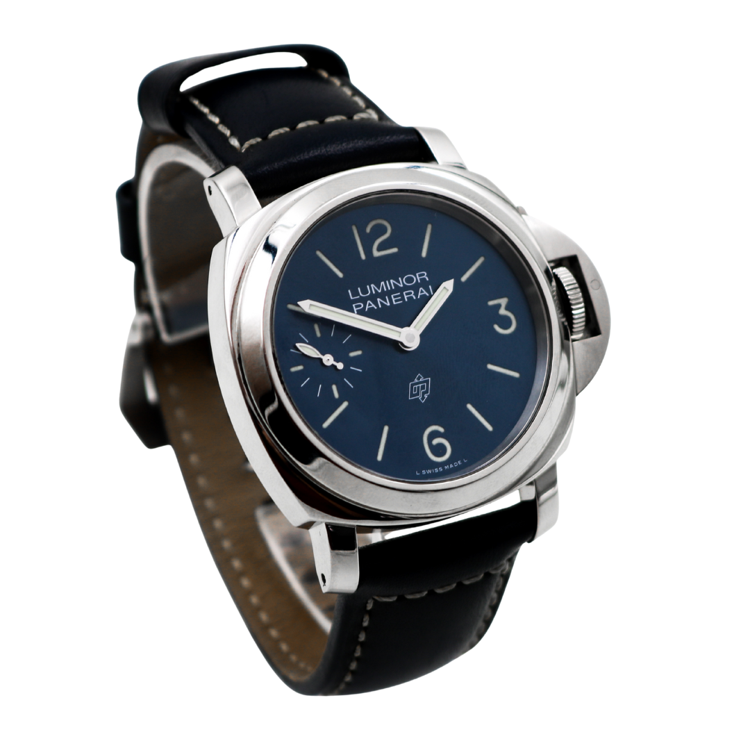 Panerai Luminor Marina PAM01085 steel case, signature crown guard, blue dial — right-angle view