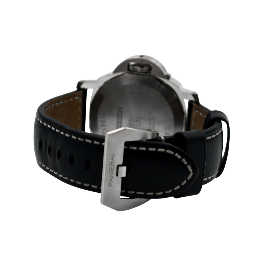 Top-down view of black leather Panerai strap with white stitching and signed tang buckle