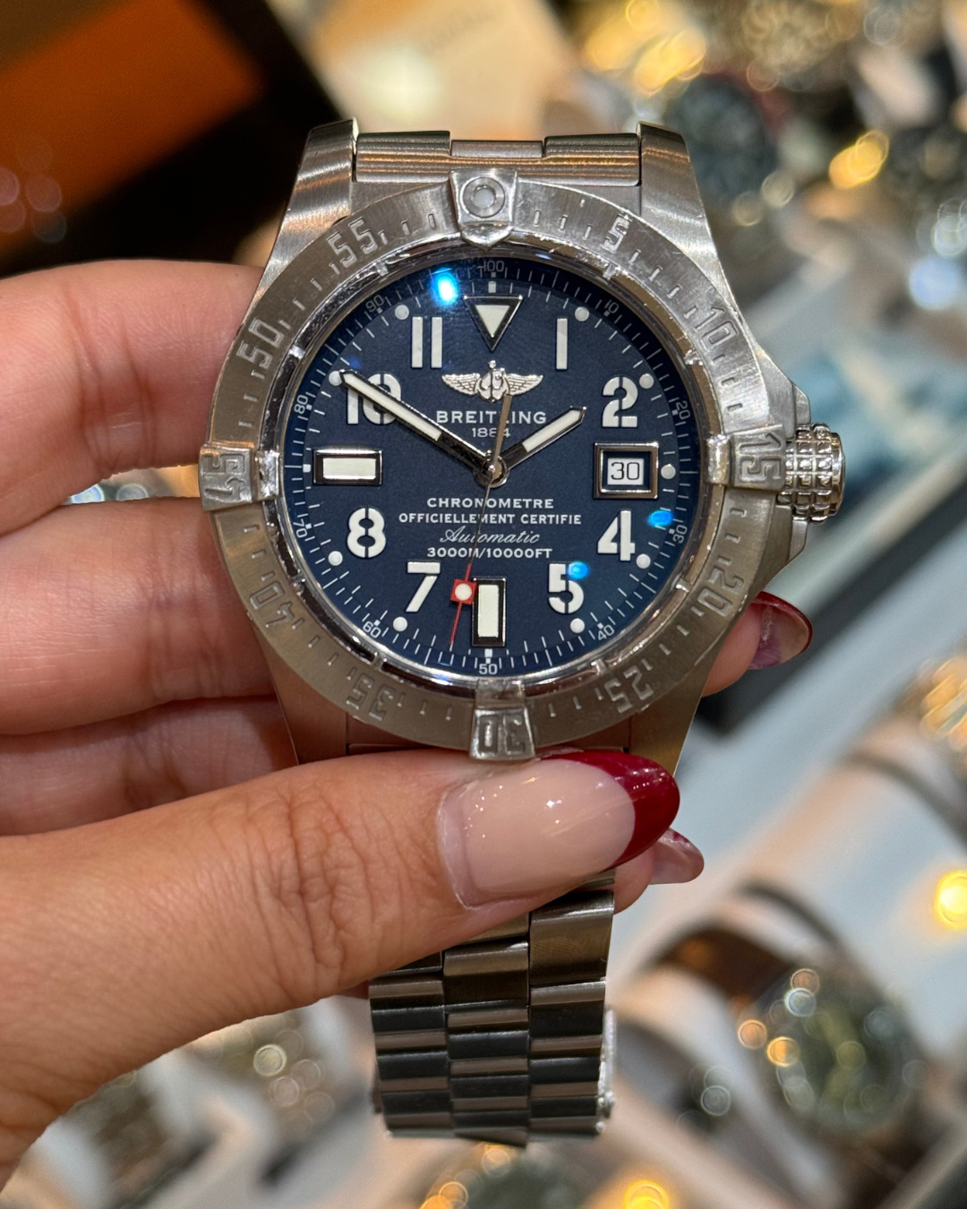 Breitling Avenger Seawolf front view, blue dial, steel bracelet.
