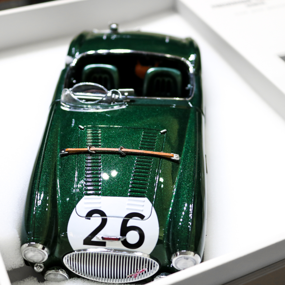 Green vintage Healey model car front view