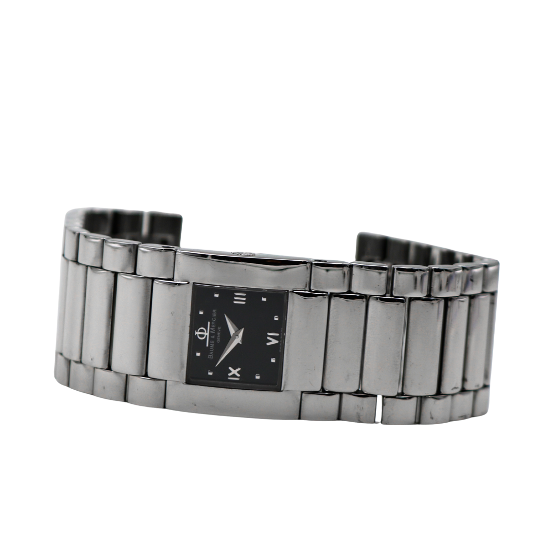 View of the Baume & Mercier Catwalk (Silver) Watch lying on its side, showcasing the profile of the case and bracelet.