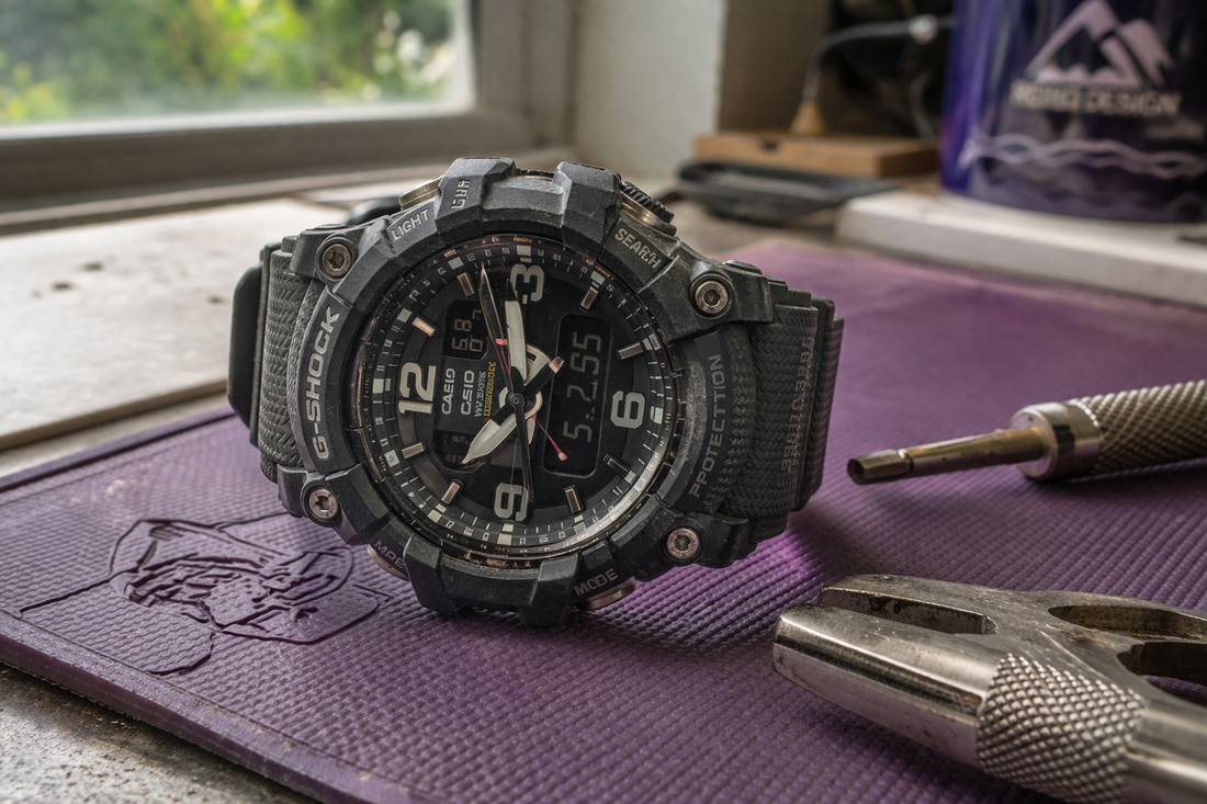 G-Shock watch with rugged design placed next to tools on work surface