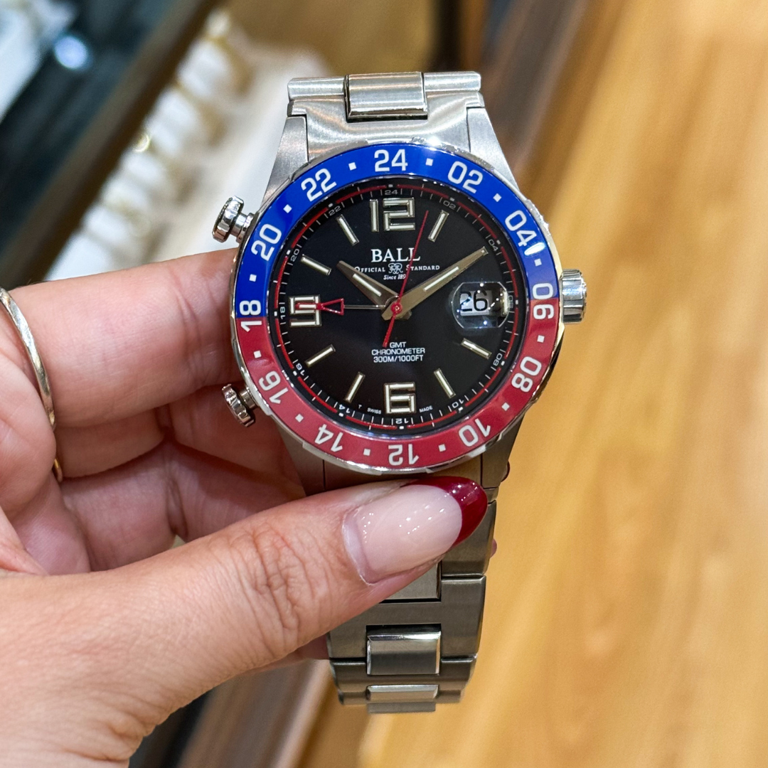 Ball Engineer III Maverick GMT watch held in hand