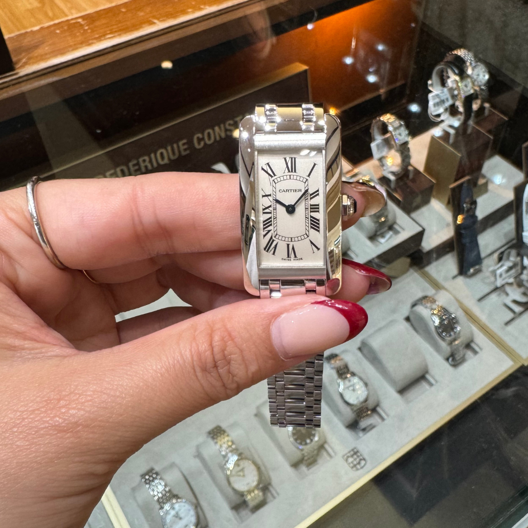 Cartier Ballon Bleu Small 18K White Gold watch held in hand