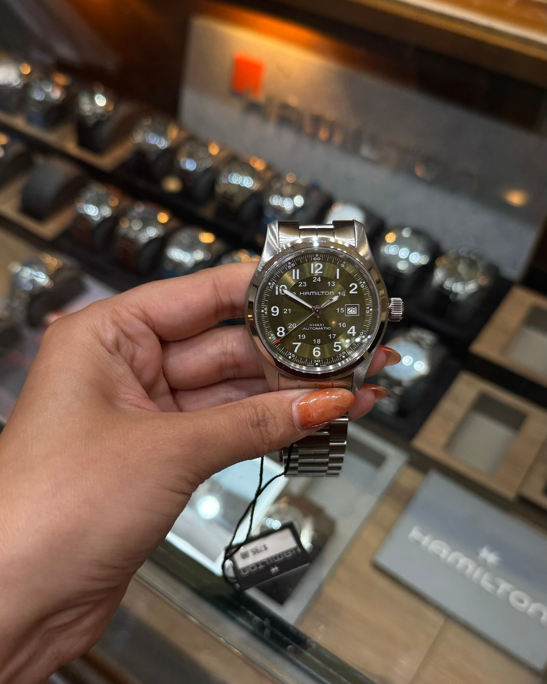 Front view of Hamilton Khaki Field Automatic with green dial and date