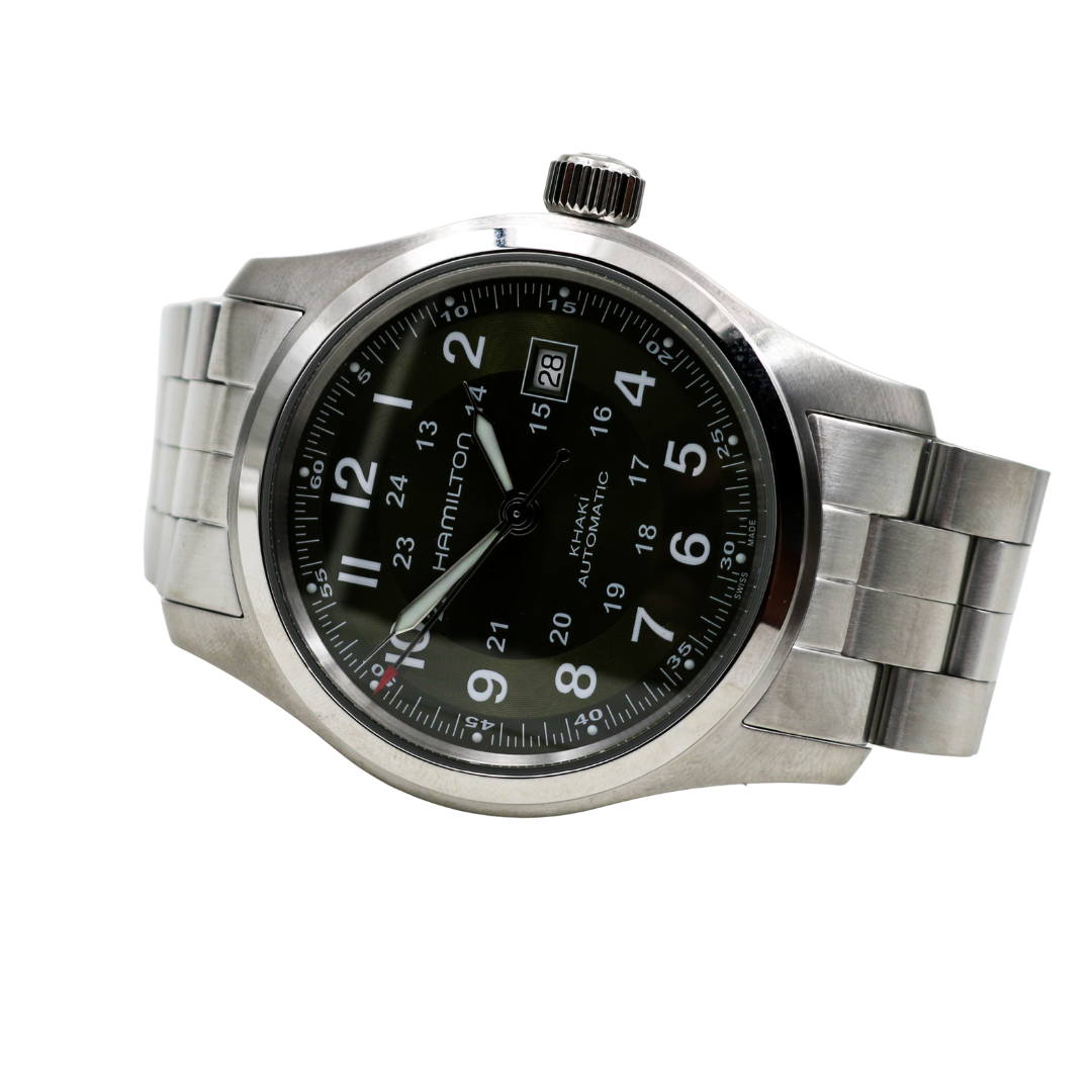 Hamilton Khaki Field green dial watch laid flat with full bracelet view