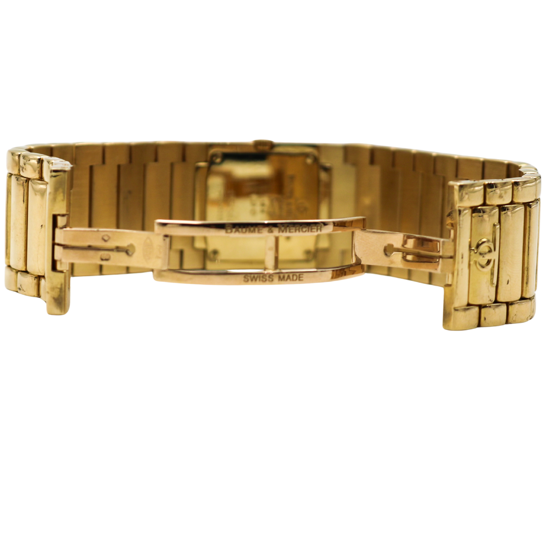 View of the Baume & Mercier Catwalk gold ladies' watch with the clasp open, revealing the inner mechanism of the clasp and bracelet design.