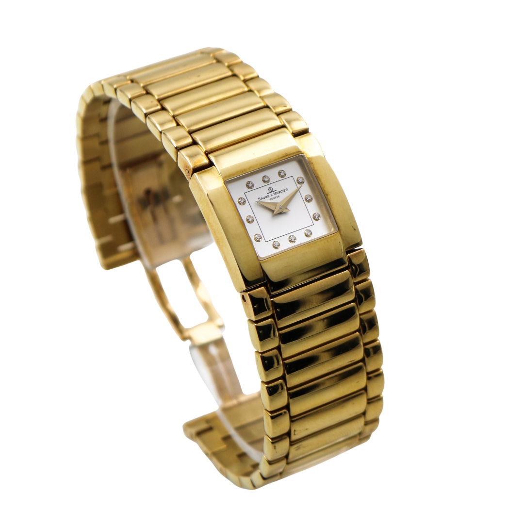 Left side view of the Baume & Mercier Catwalk gold ladies' watch, highlighting the polished gold-tone stainless steel case.