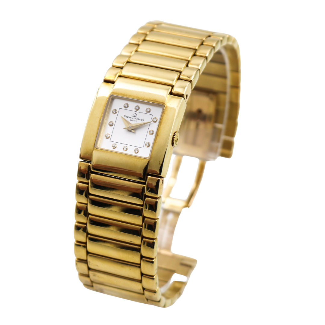 Right side view of the Baume & Mercier Catwalk gold ladies' watch, showcasing the gold-tone crown and case details.