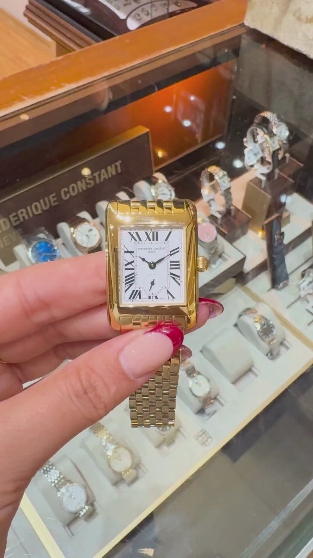 360-degree video of Frederique Constant Classics Carrée Small Seconds 36 mm in yellow-gold tone, featuring a rectangular white dial with Roman numerals, small seconds subdial, polished gold bracelet, and engraved caseback.
