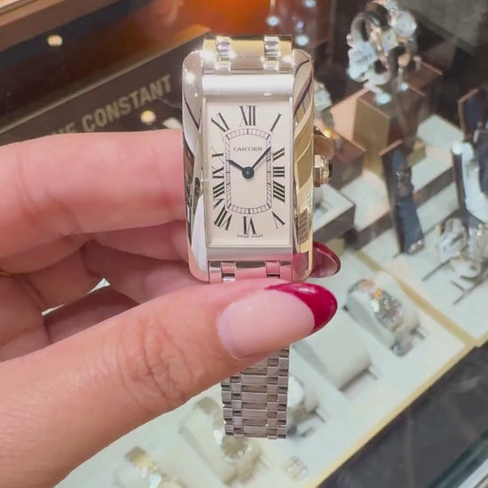 Cartier Ballon Bleu Small 18K White Gold watch held in hand