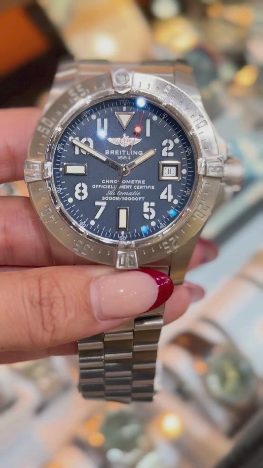 A video of Breitling Avenger Seawolf front view, blue dial, steel bracelet.