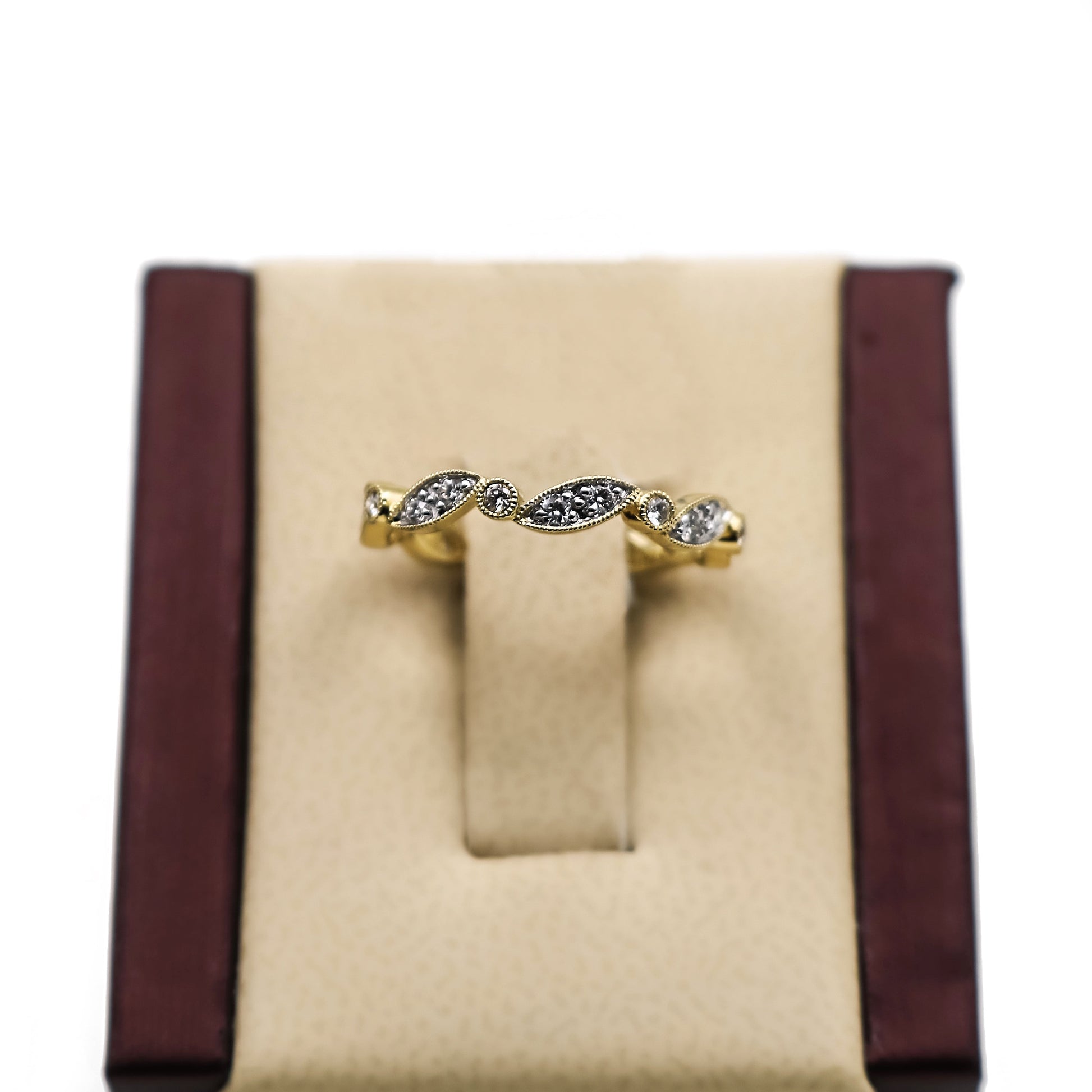 14K Gold fancy band with Diamond Stones