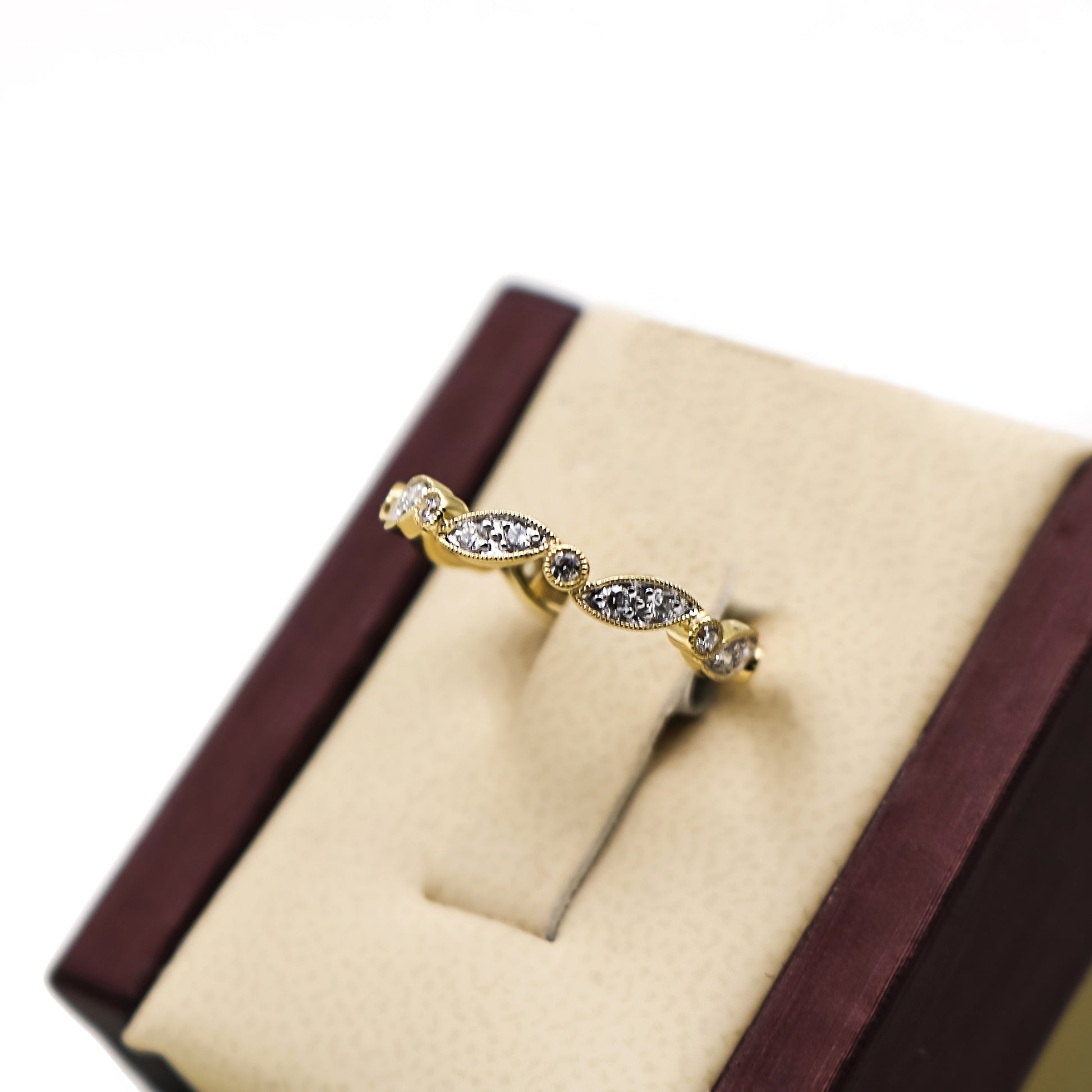 14K Gold fancy band with Diamond Stones
