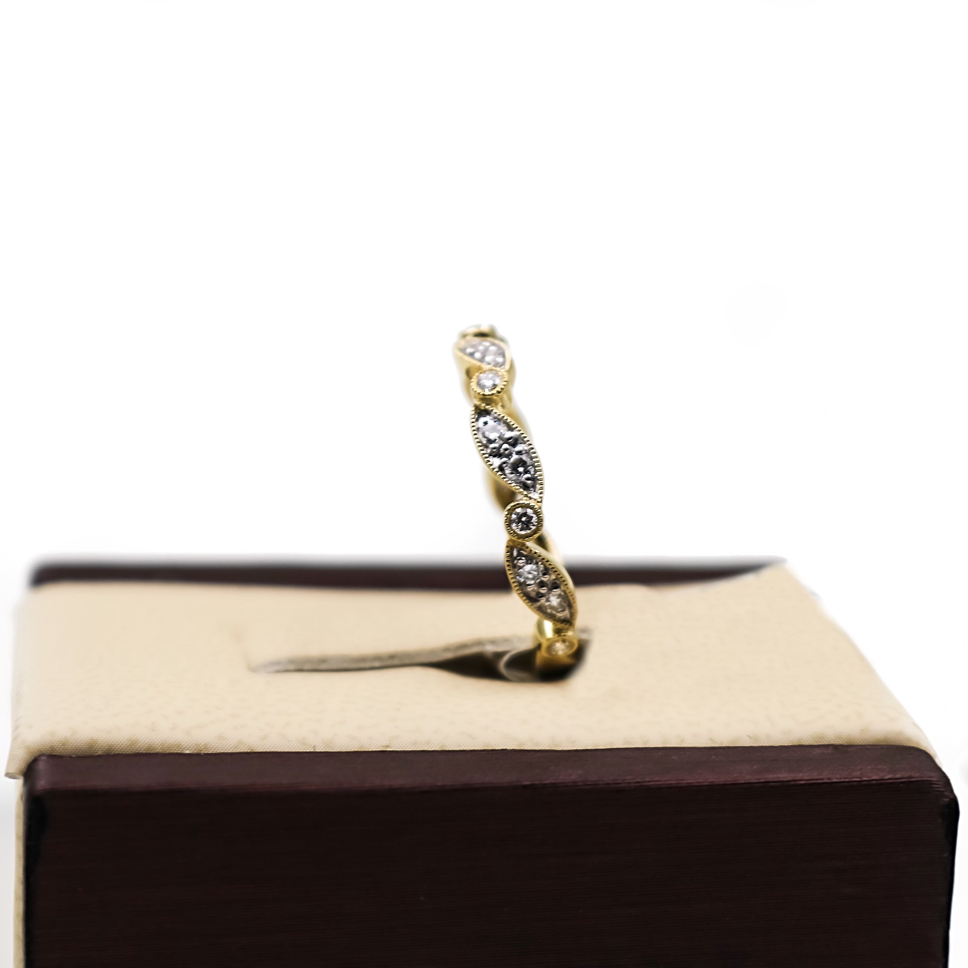 14K Gold fancy band with Diamond Stones
